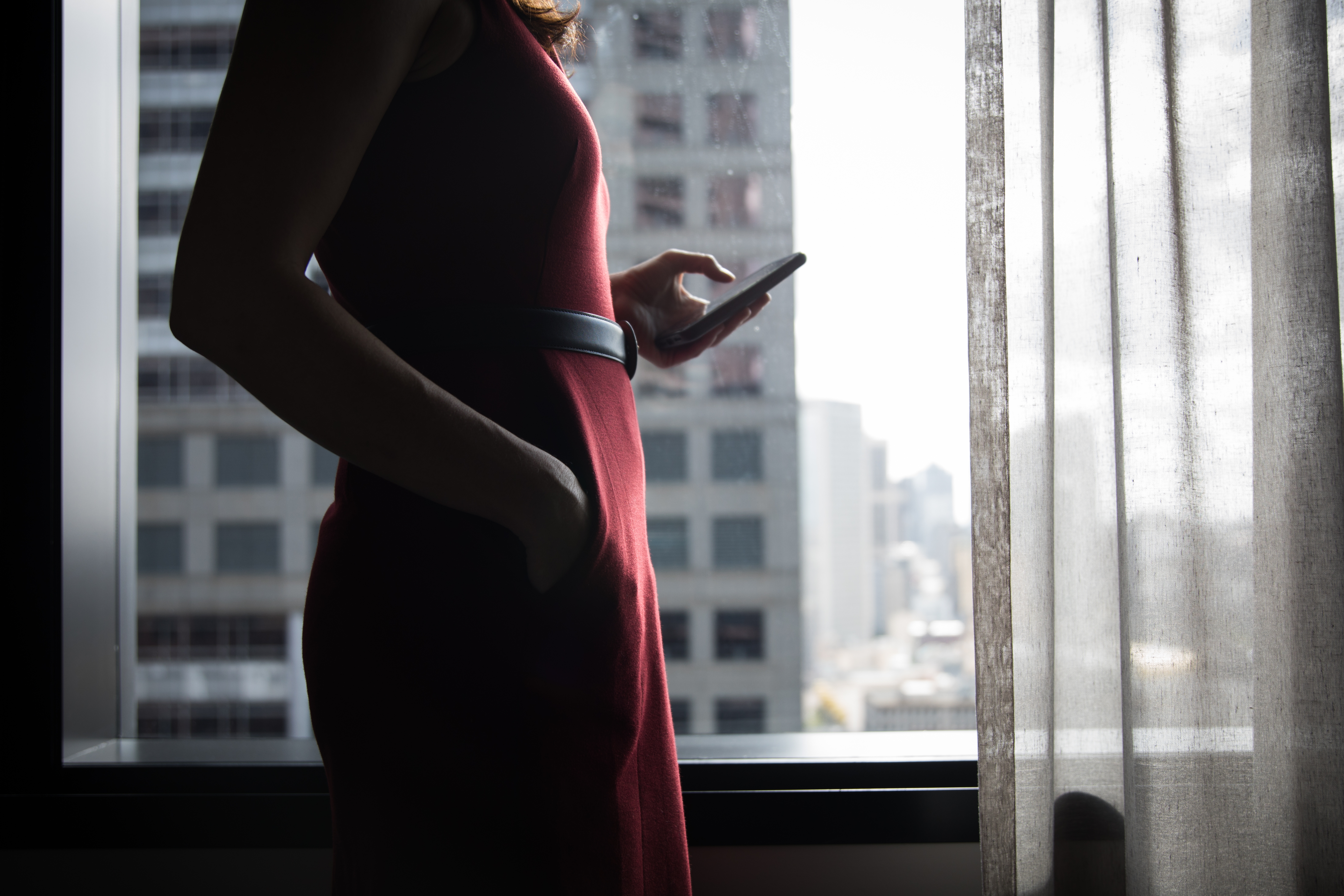 A woman looking at her phone